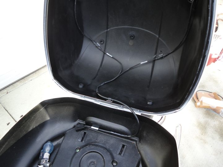 Use 3 of the 4 supplied clips to hold the wires tidily out of the way of any cargo.