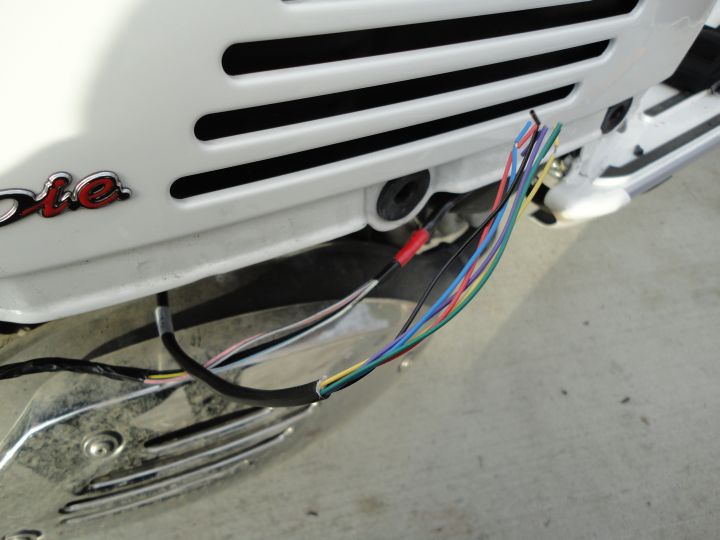 Connect up the remaining bit of kit, feed it alongside the gas filler neck and down to the outside world.