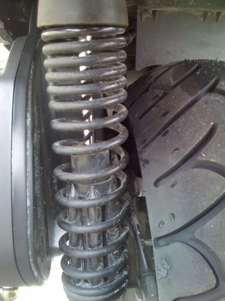 View of left shock and tire. Plenty of room.