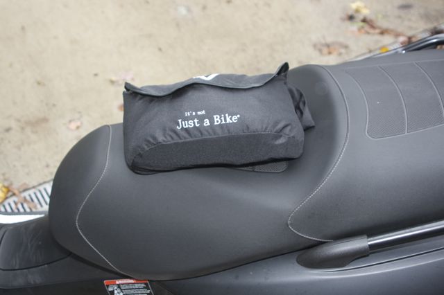 Cover fits into a bag easily stored under the seat.