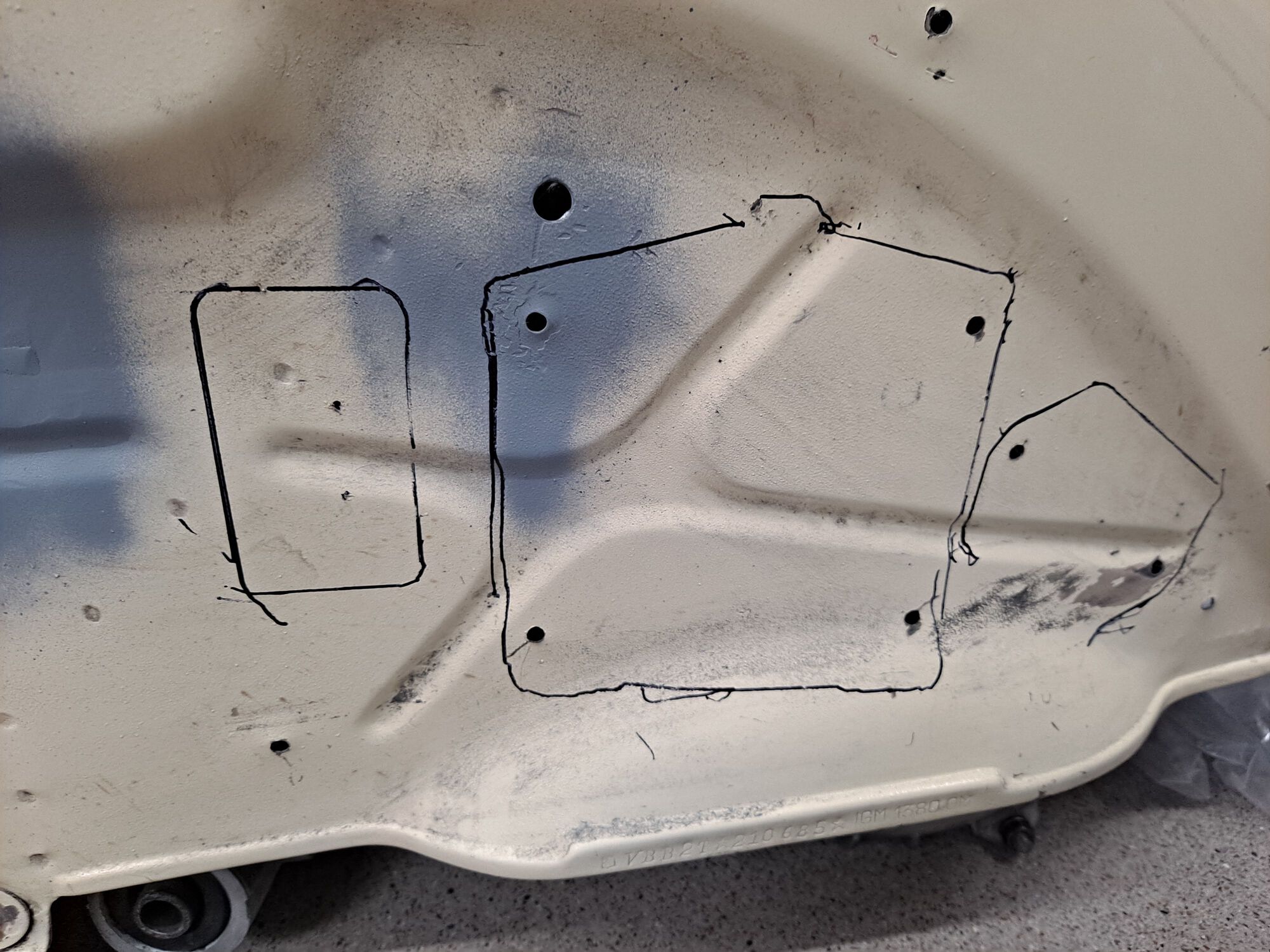 Welding up holes and laying out where the battery tray, voltage regulator, and other wiring will go in the side glovebox