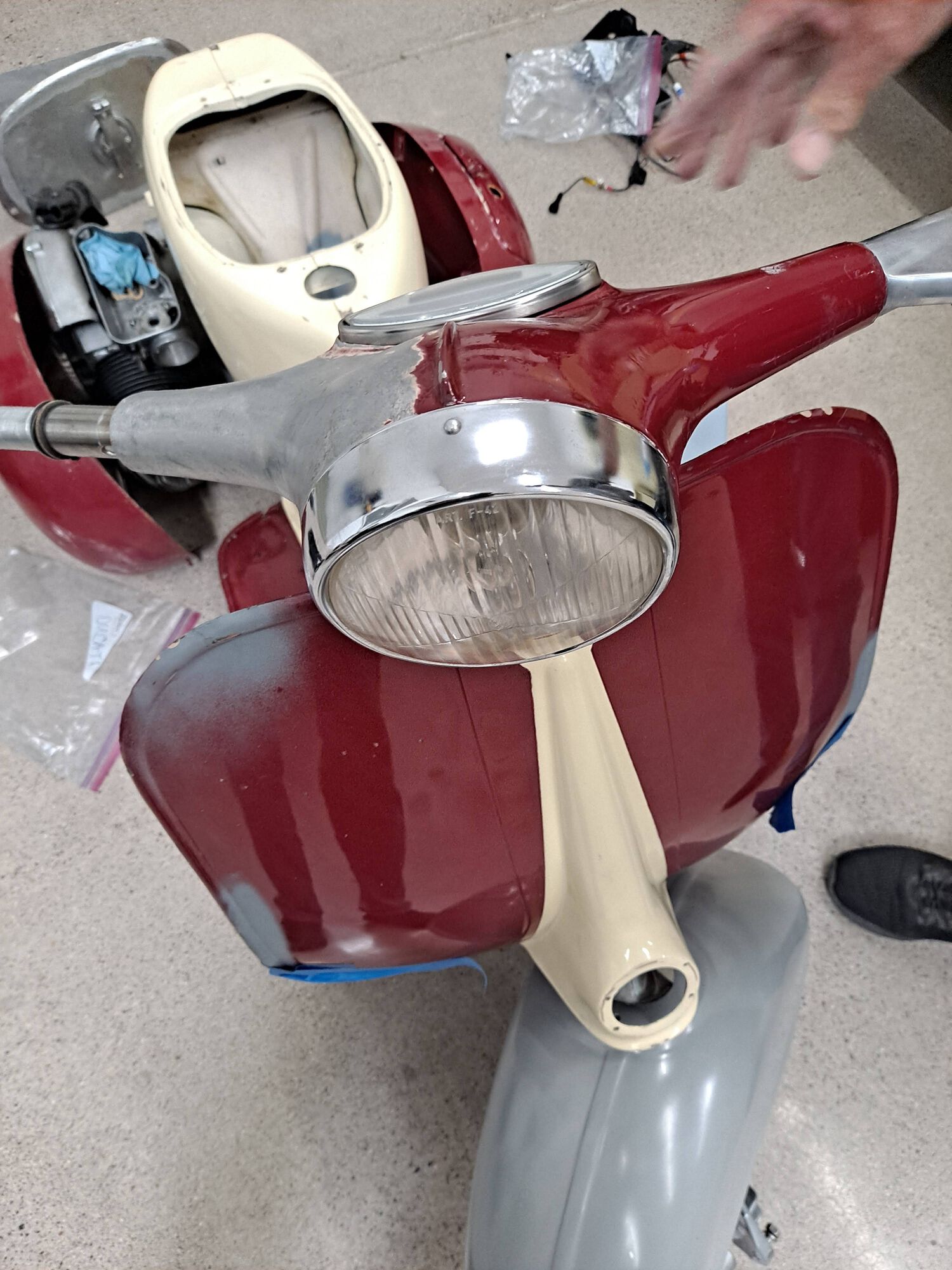 My first attempt to drill a hole for the hydraulic brake line was poorly placed, so I removed the paint off that side of the headset to fill the hole and do it right.