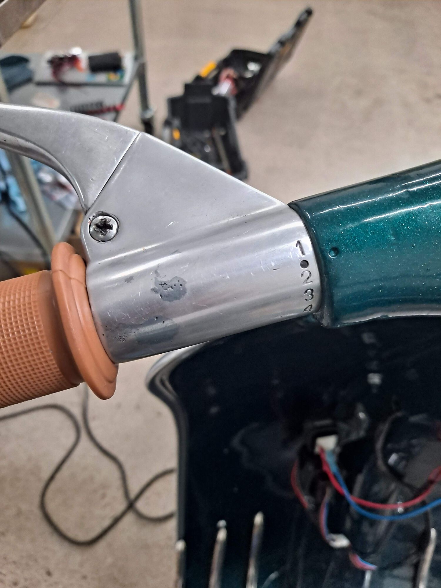 I plugged up the unholy mess I had originally put in the aluminum handlebar for the turn signal switch, and that made my life more difficult by needing to figure out a better solution for indicator buttons on the right side...  Stay tuned.