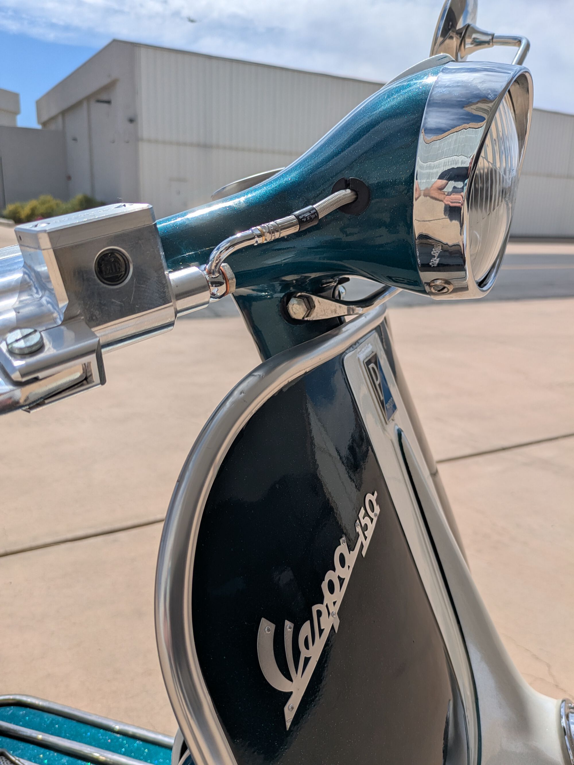 Here's the mirror mount and a closeup of the hydraulic cylinder and line.