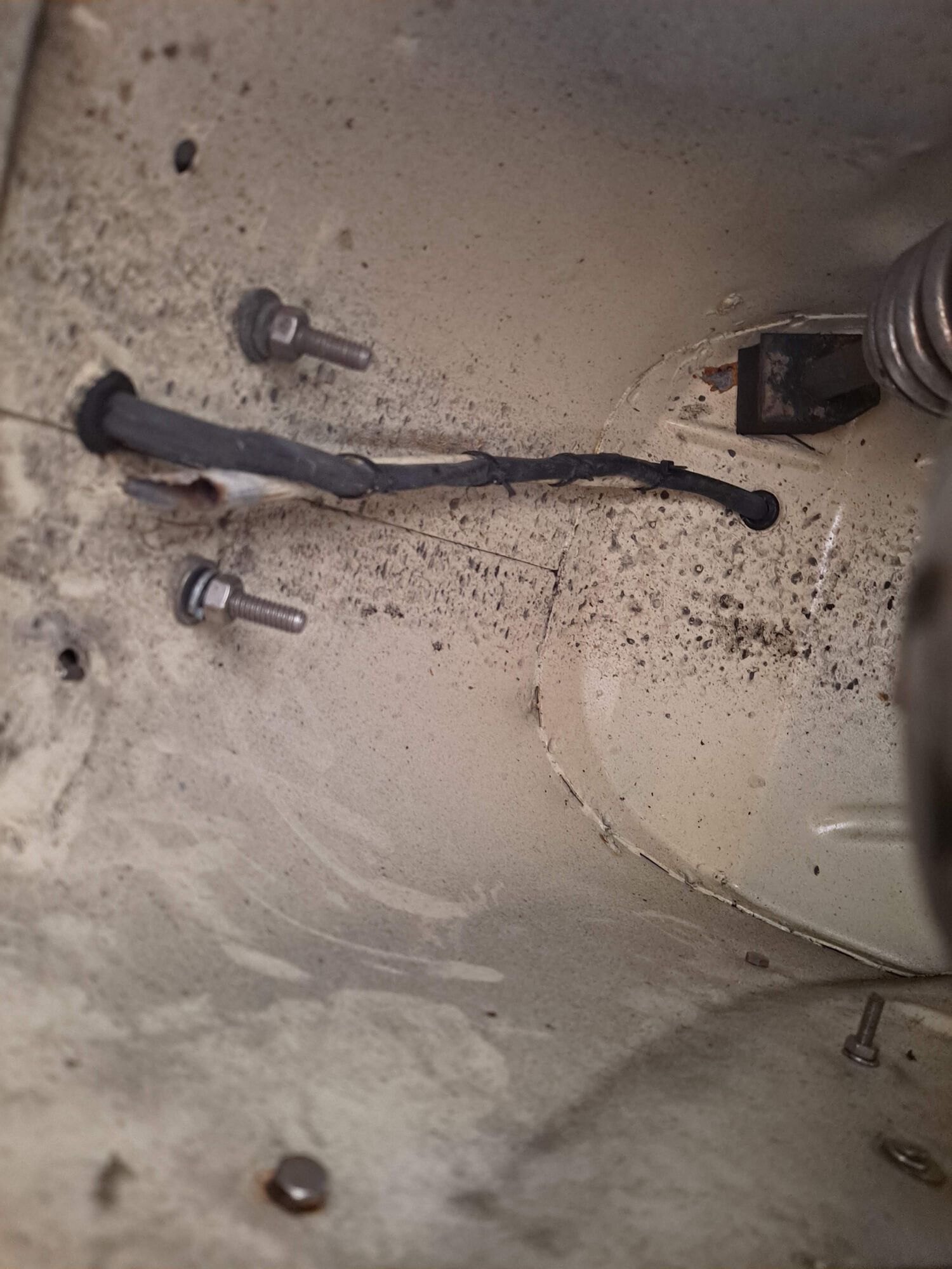 Taking things apart I'm finding all the corners I cut, like running loose wiring under the rear frame...