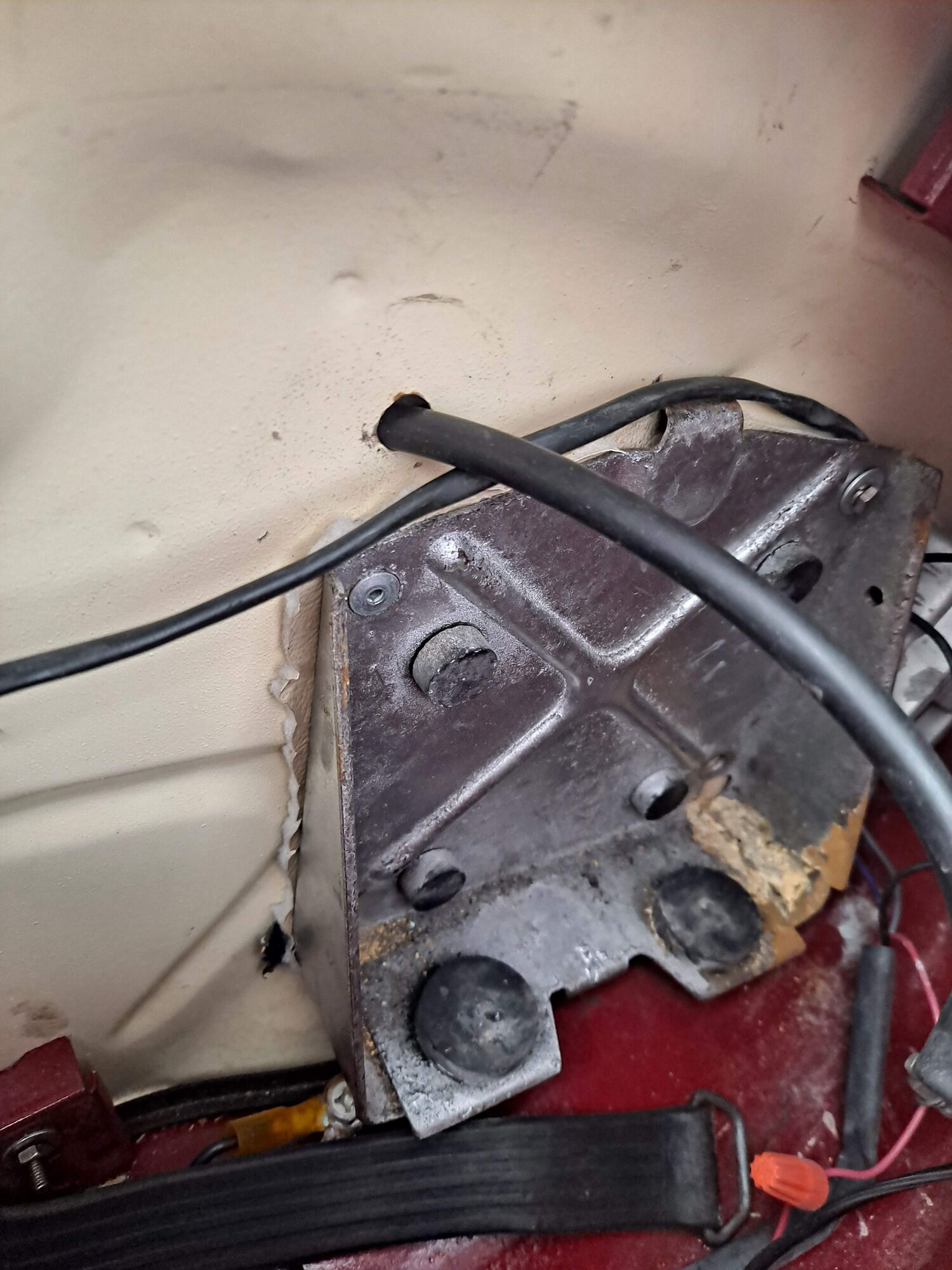 Lots of weird stuff going on here, including the remnants of vinyl lining behind the battery tray.  Weird college brain tried to line the whole glovebox with it.  Don't ask why, I took it out soon after I did it.