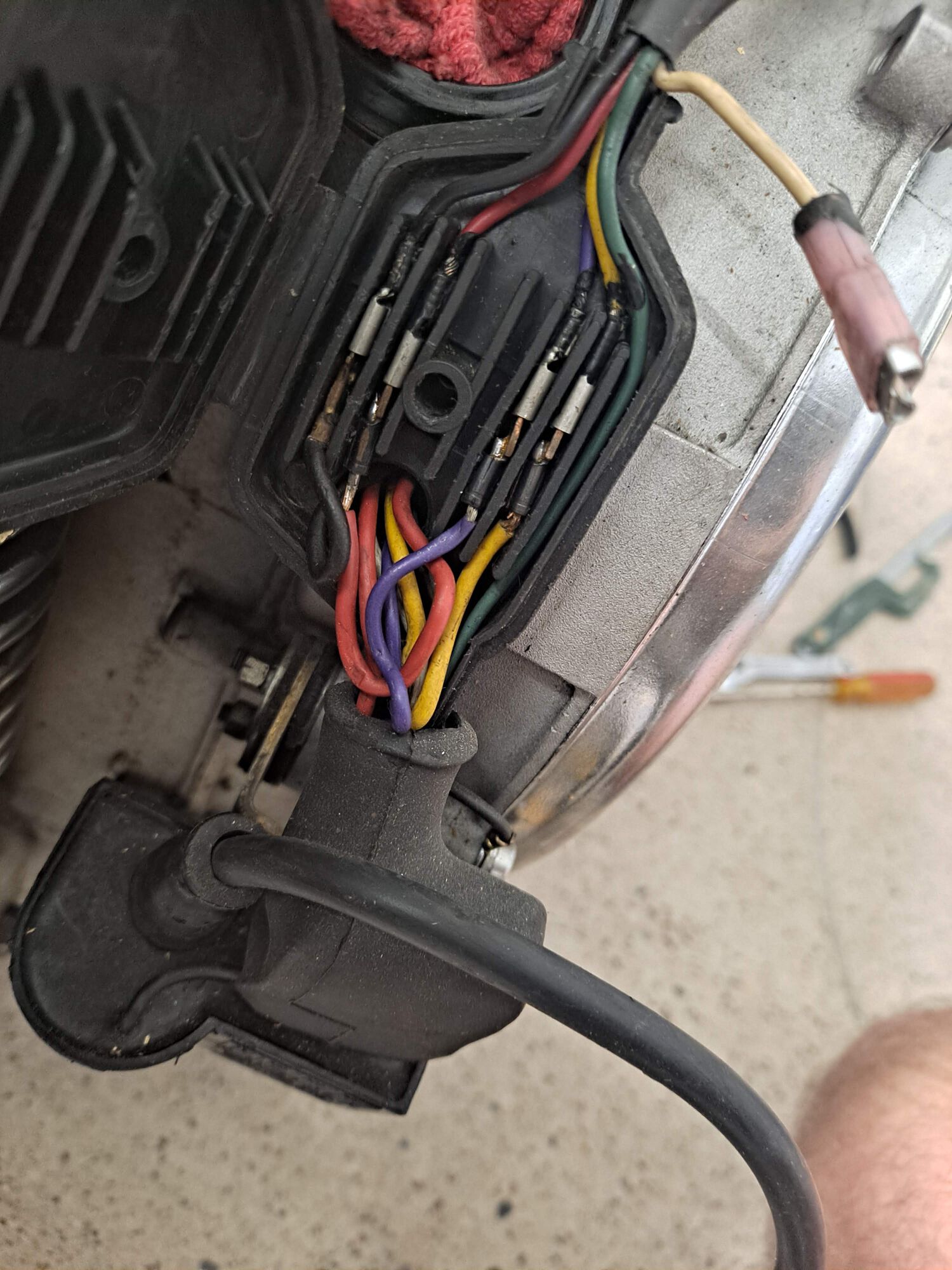 I wound up replacing the ignition and upgrading to a lighter flywheel.  The minute I started monkeying around in the junction box, the original wires just disintegrated.