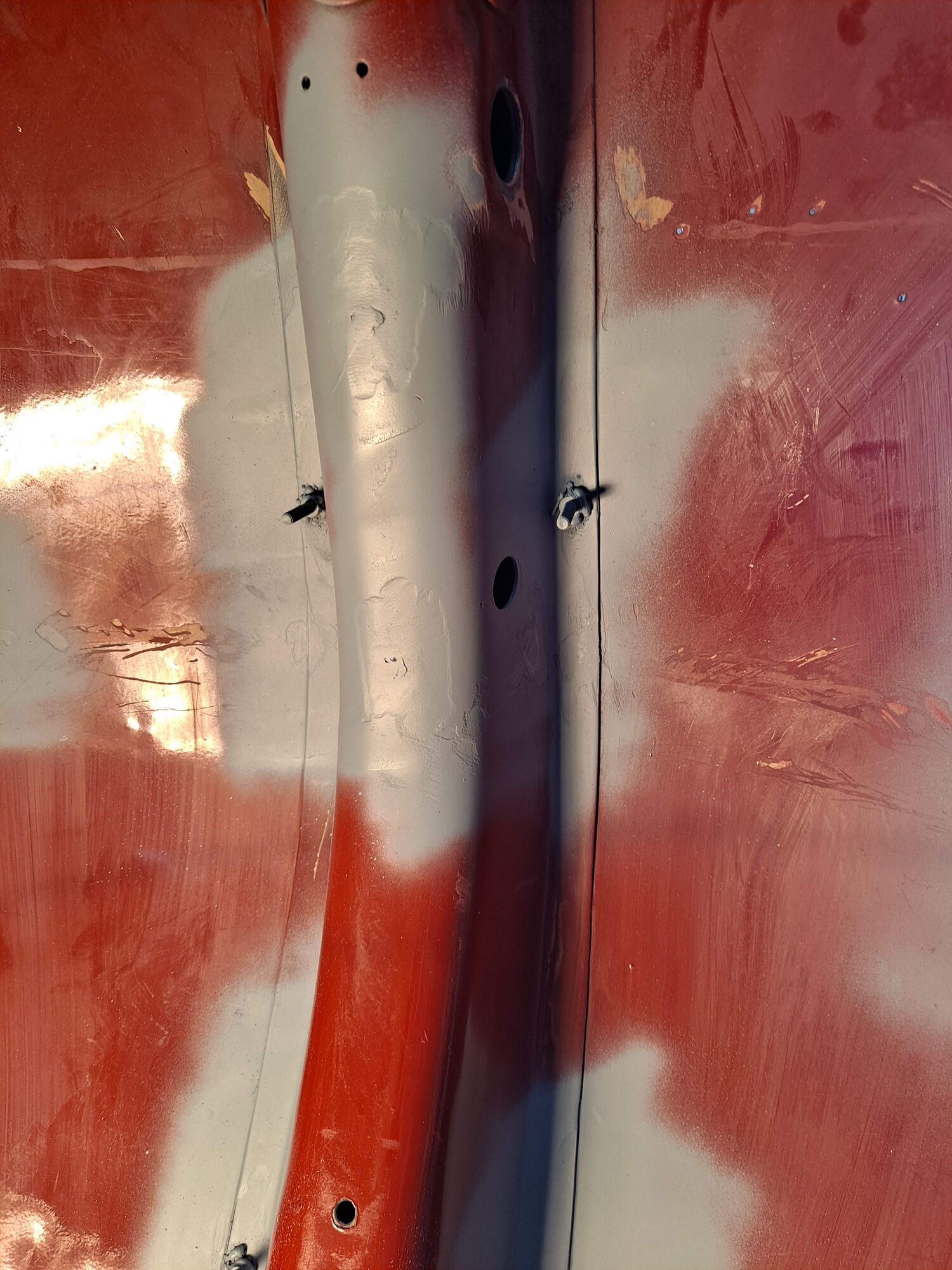 Installing some mounting bolts for the legshield glovebox