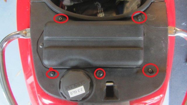 remove the 5 screws and the gas cap to remove the cover
