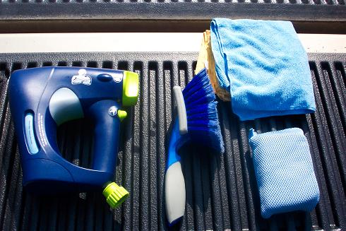 I use a soft sponge for bodywork, soft bristle brush for undercarriage and tires, and Mr. Clean for washing(has Pur Water filter and spot free dry)