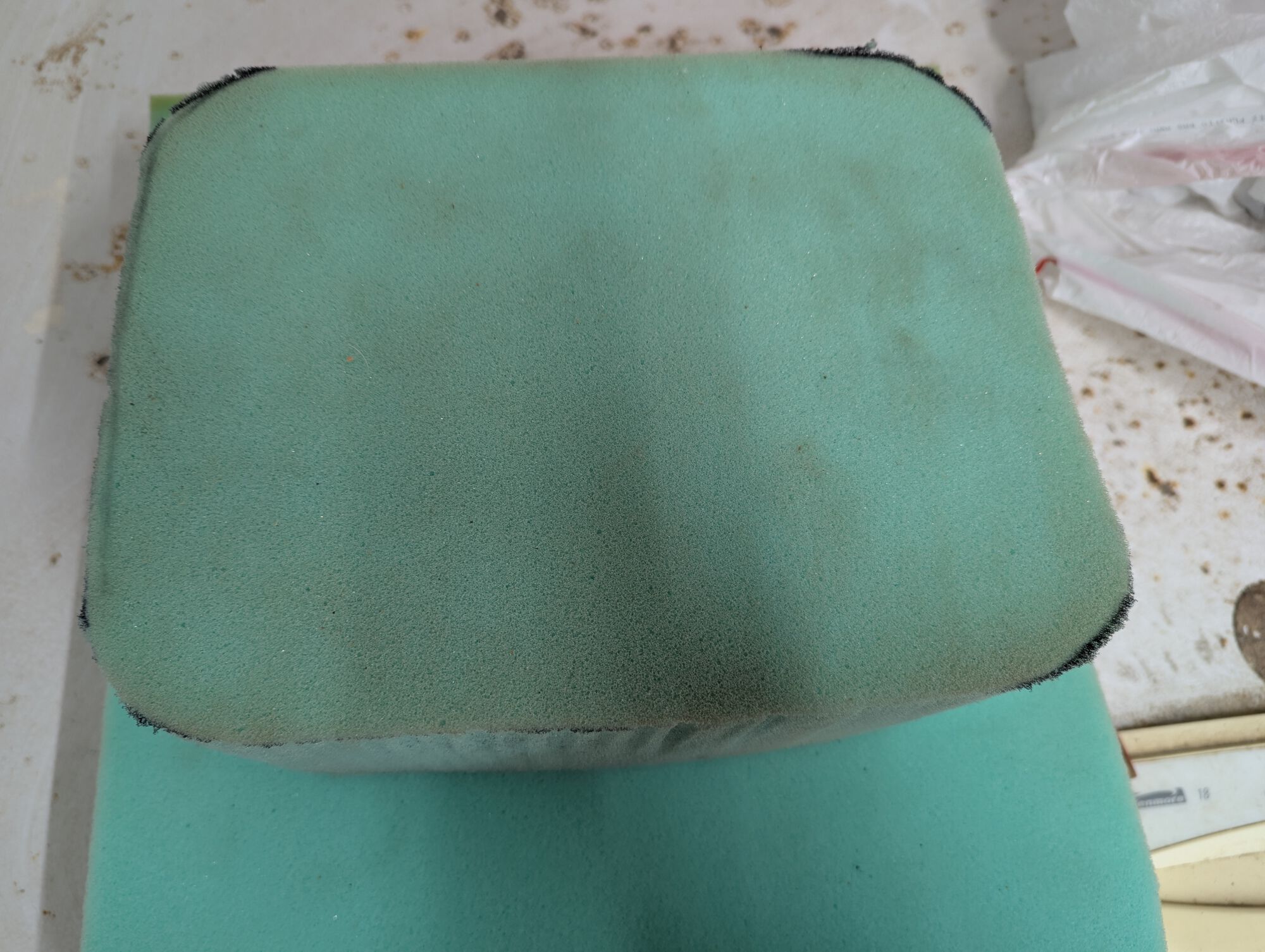 Kind of squishy 4" foam, a little refined on my belt sander.