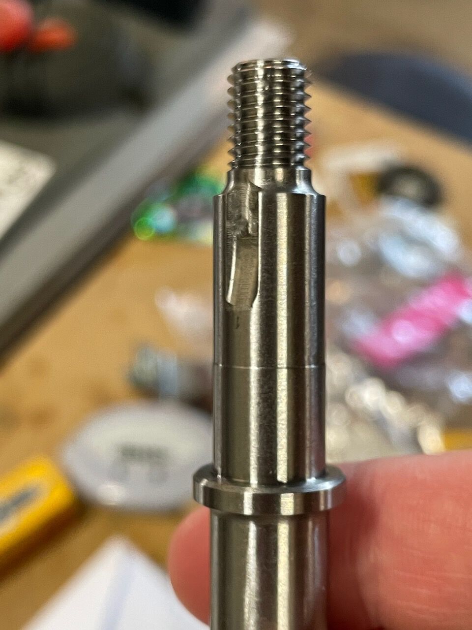 Milled groove for clutch nut/washer finger thing