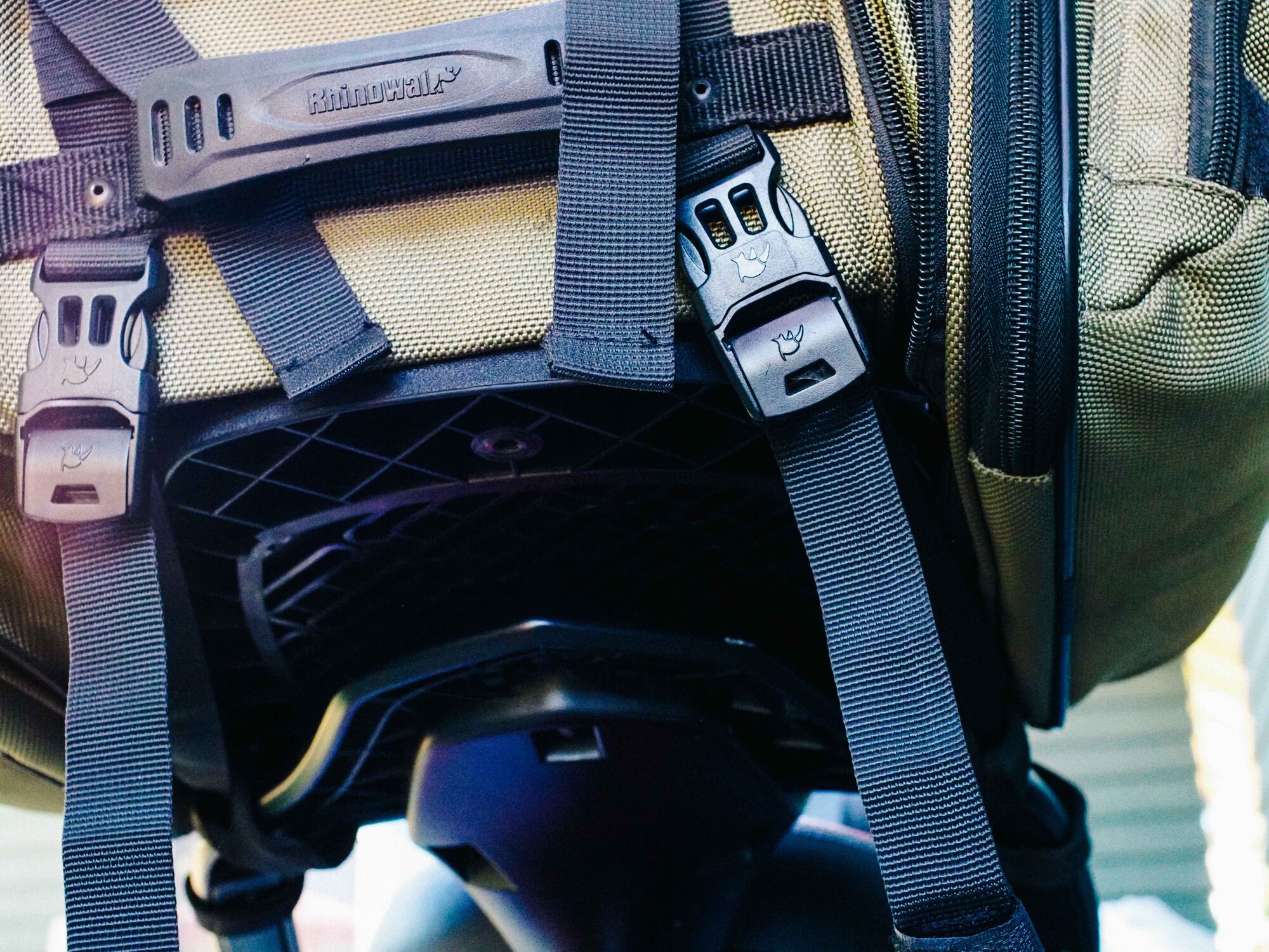 a view of the underside showing the hard plastic mounting kit hardware aka rack