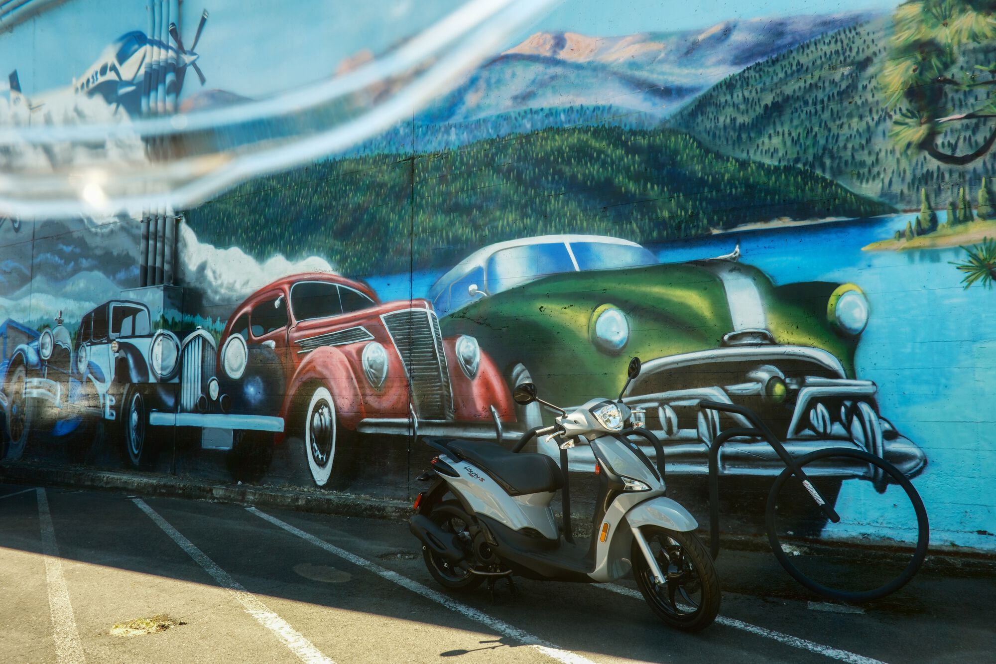 4-wheeled airbrushed Art meets 2-wheeled Italian-designed Art