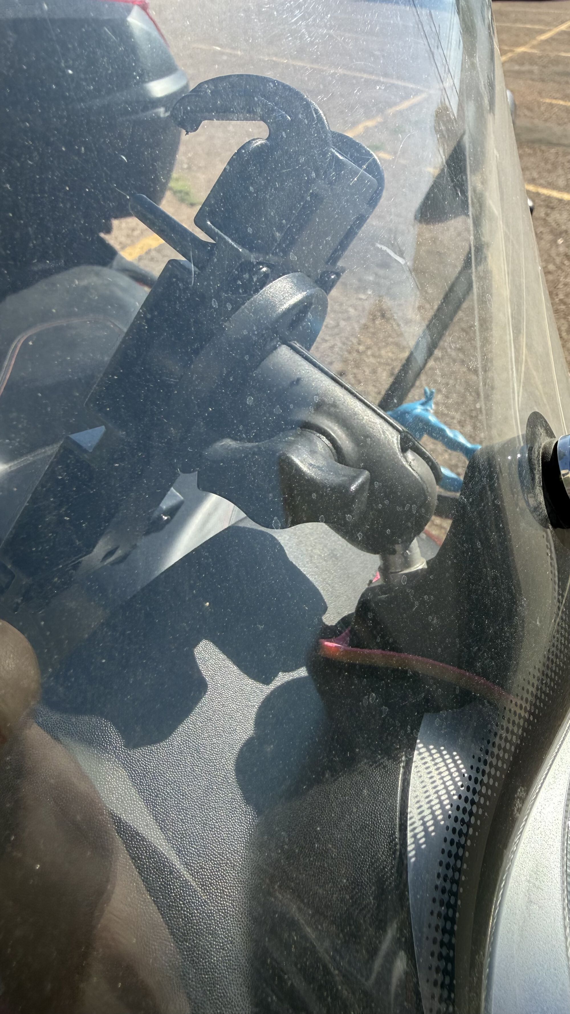 Current phone mount setup, view through windscreen.