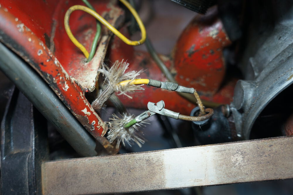 I have never seen these wire connectors before. The braided covering was pulled over the joint .
