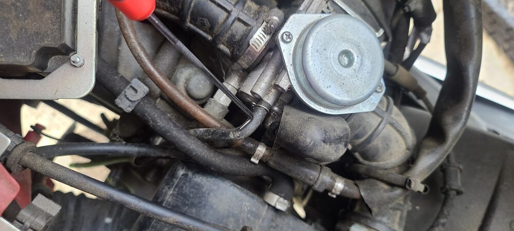 This is the other one coming from the carburetor.