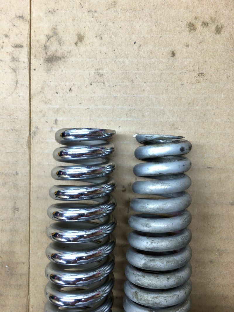 Here you can see that the replacement spring is fatter at the bottom.