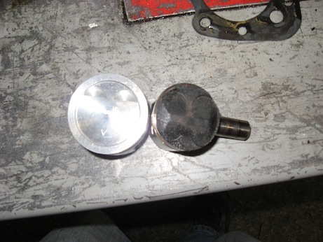 Side by side the new 78cc piston and the 49cc