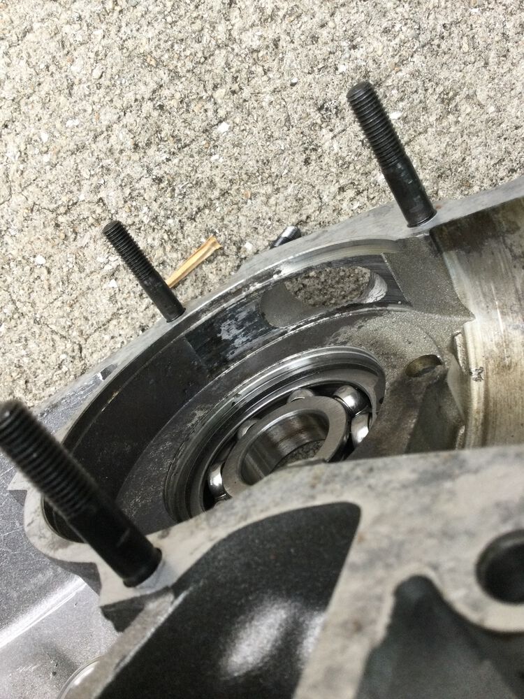 How can I clean up the rotary pad without damaging it, it has no scratches, nothing a fingernail get's caught in