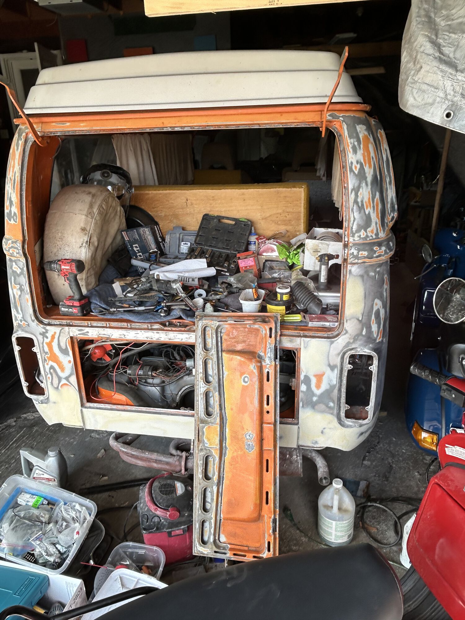 Filler work done, engine hatch sandblasted and a couple small patches welded up on the backside.