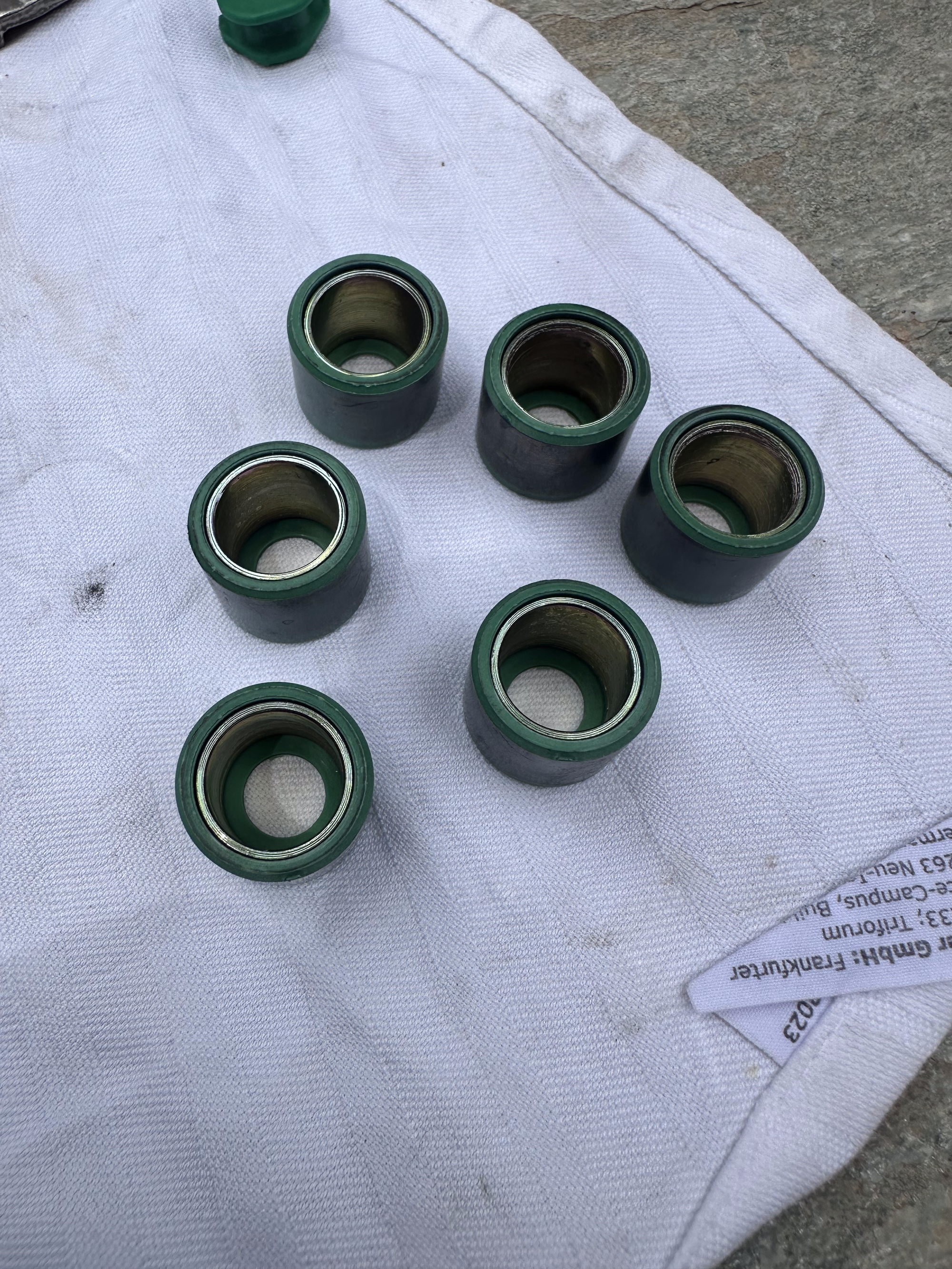 The new stock rollers with one side completely open.