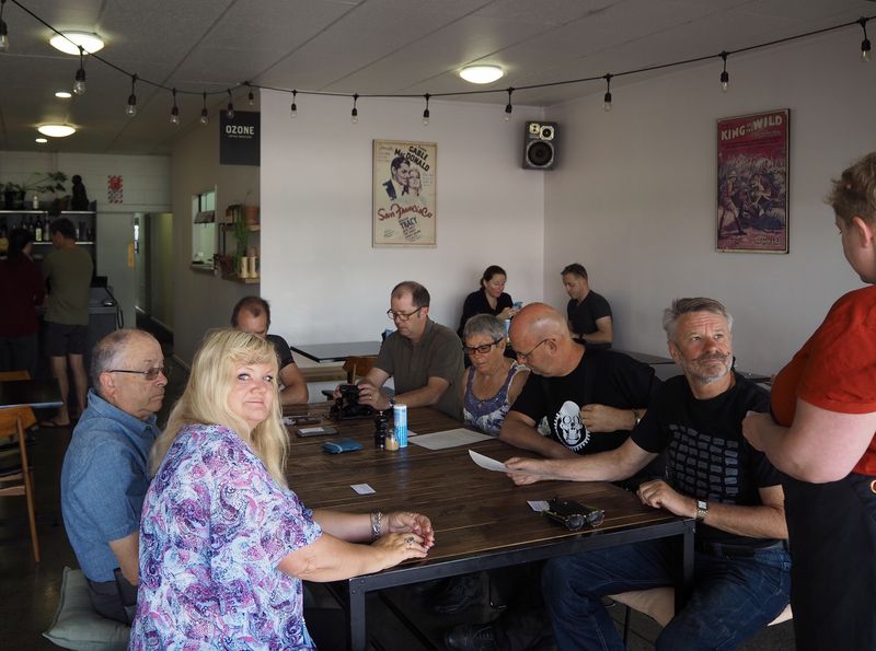 Most of the crew ready for breakfast before the trip home.