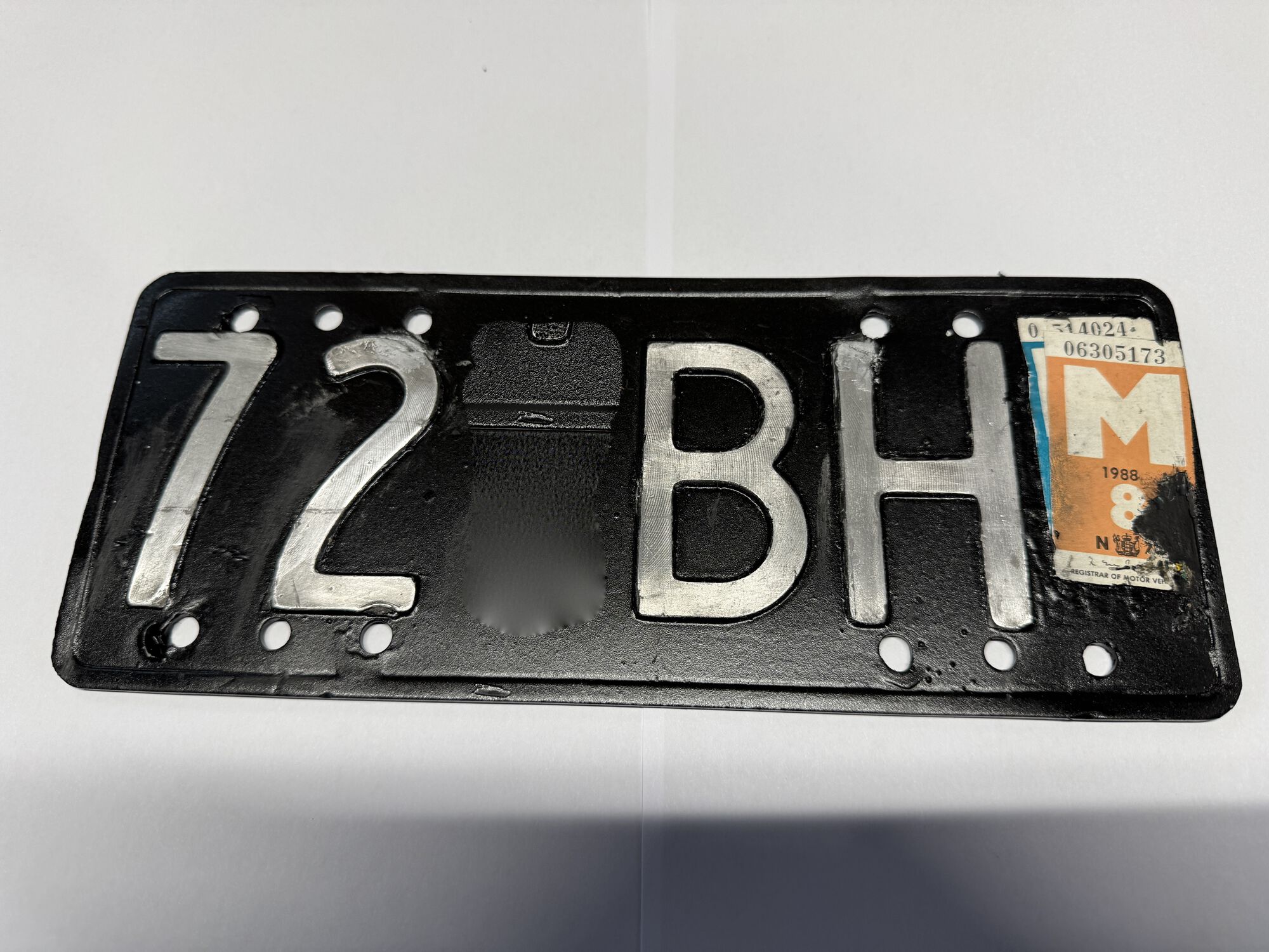 Plate from the 1960s. NZ changed to permanent plates in 1964.