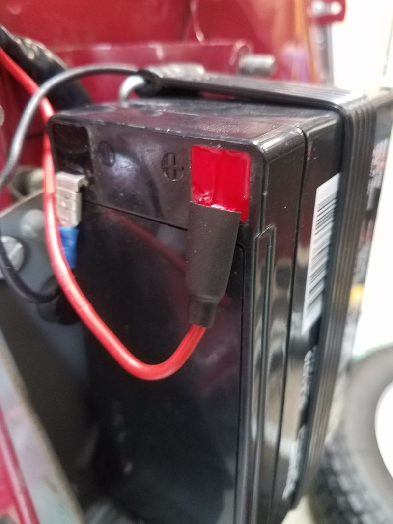 Used heat shrink tubing to protect the positive connector, but just shrank the part on the connector so I can still remove it from the battery.