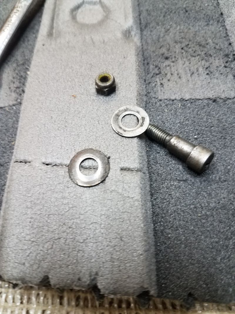 Washers and bolt for the lever.