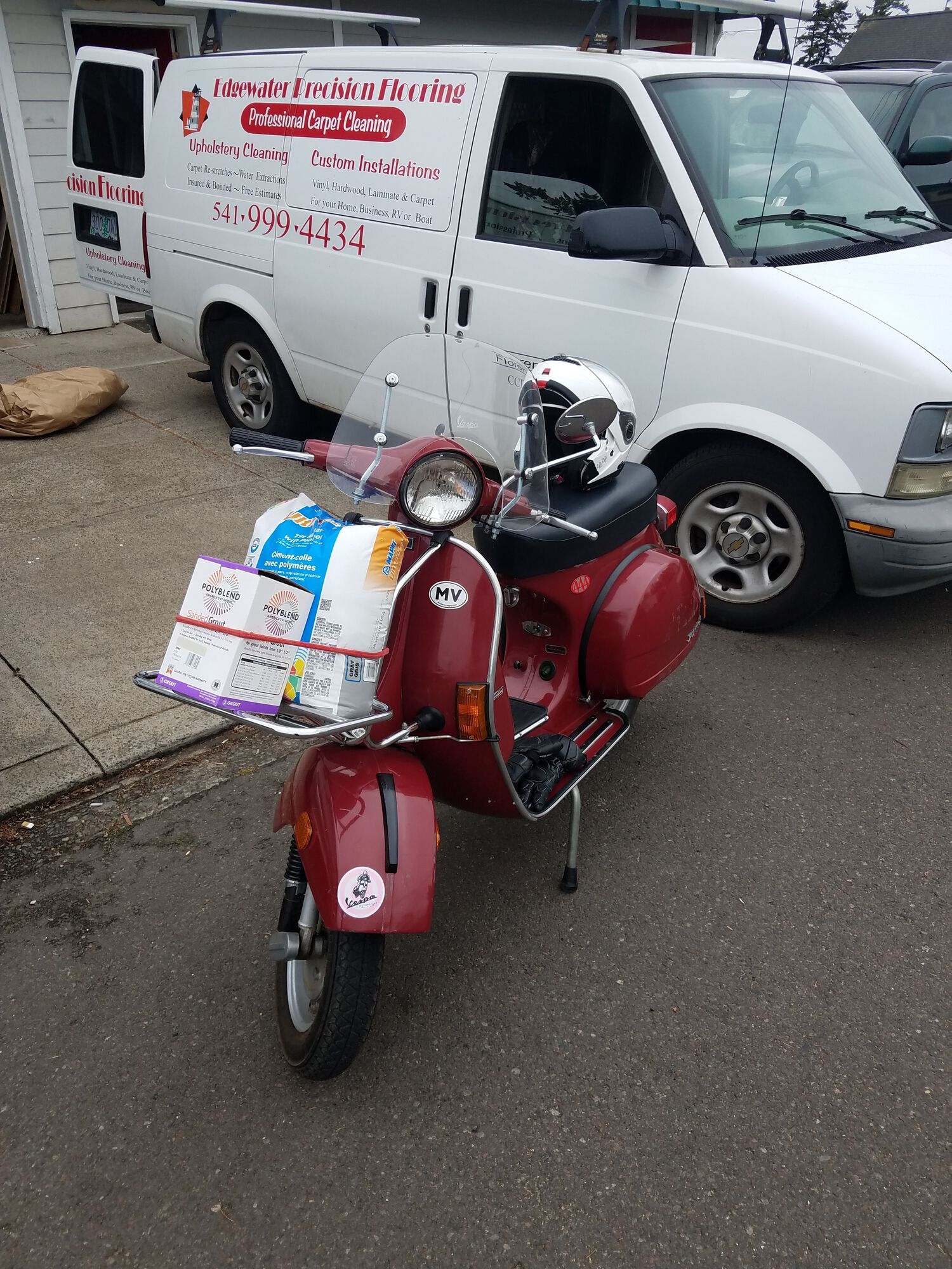 Passing off excess tile supplies...