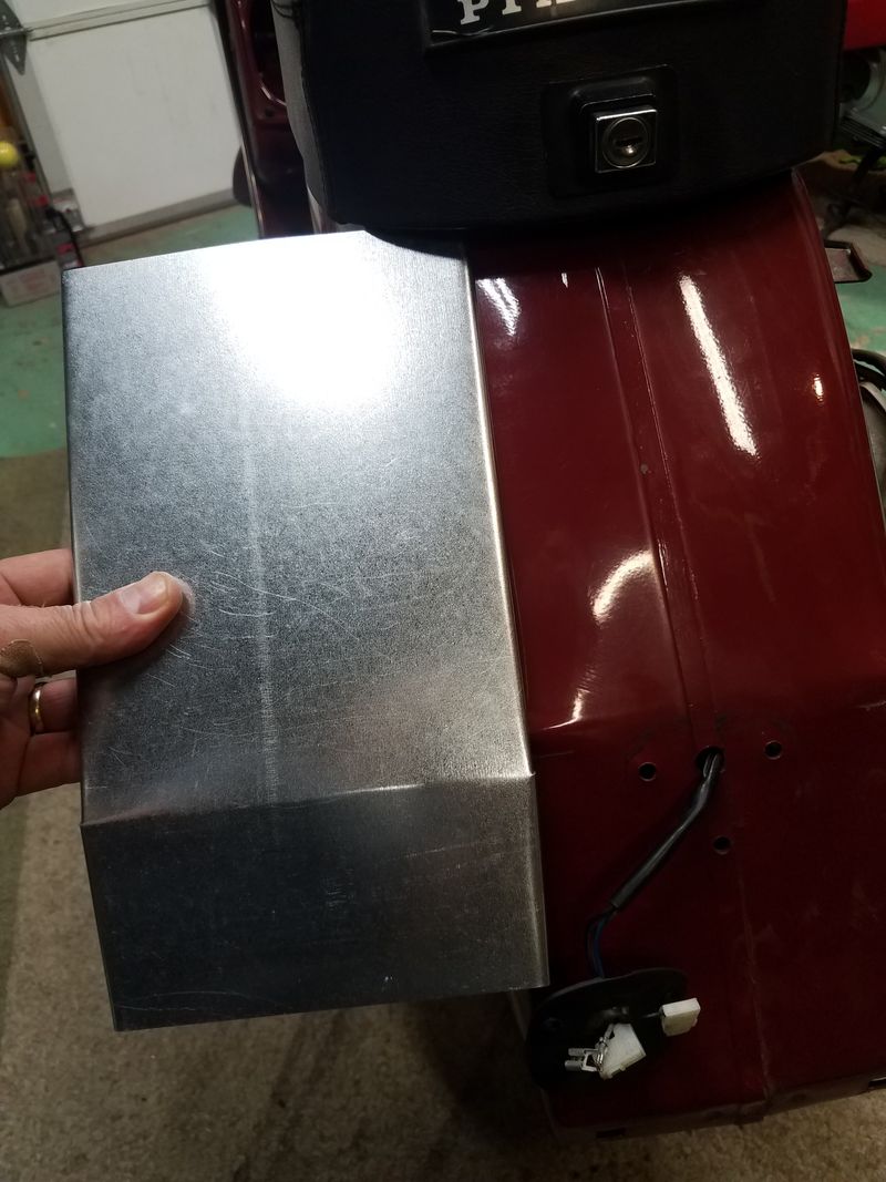 The bent up piece of sheet metal to match the drawing.