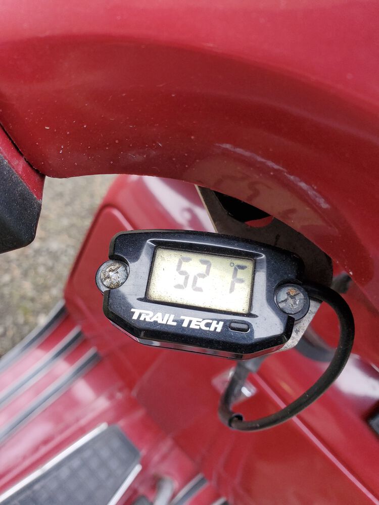 The temp on the left. I've got the rev counter on the right