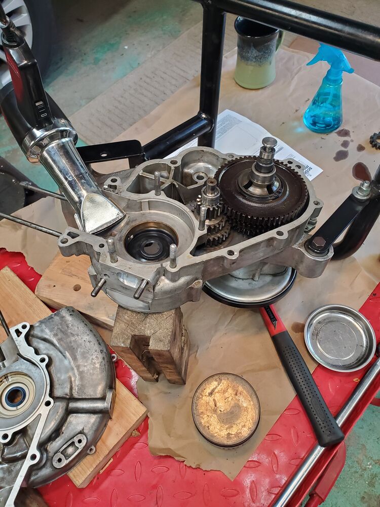 Cleaned up the case halves with alcohol, put RTV on the gasket, heated up the case halves, and put it together, and remembered the kick start gear :)