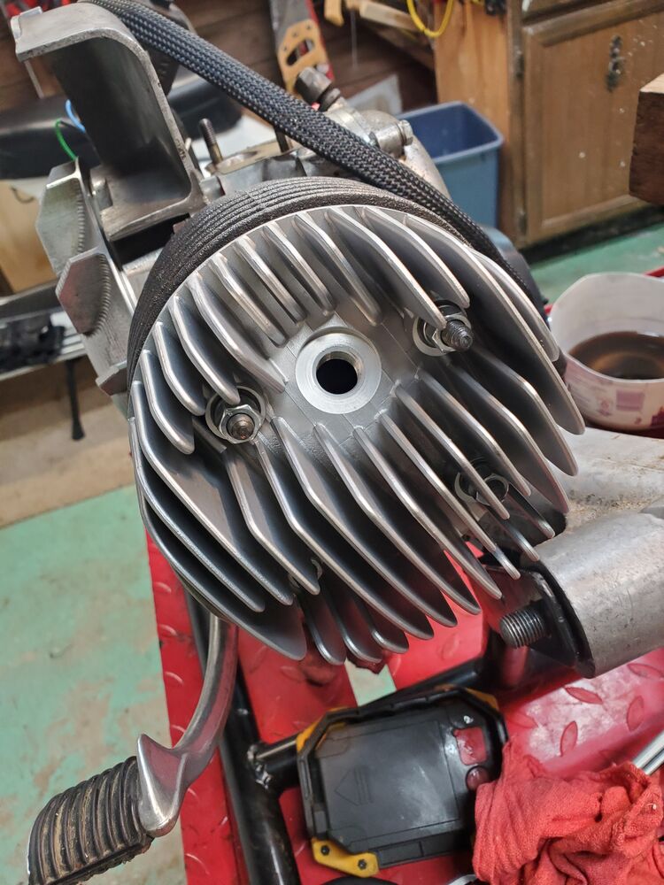 Head greased lightly and torqued down.