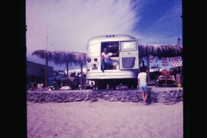 Dad surveying the beach from the bus. It was a blast to jump out the back BTW. Run and fly out the back door and roll in the sand...