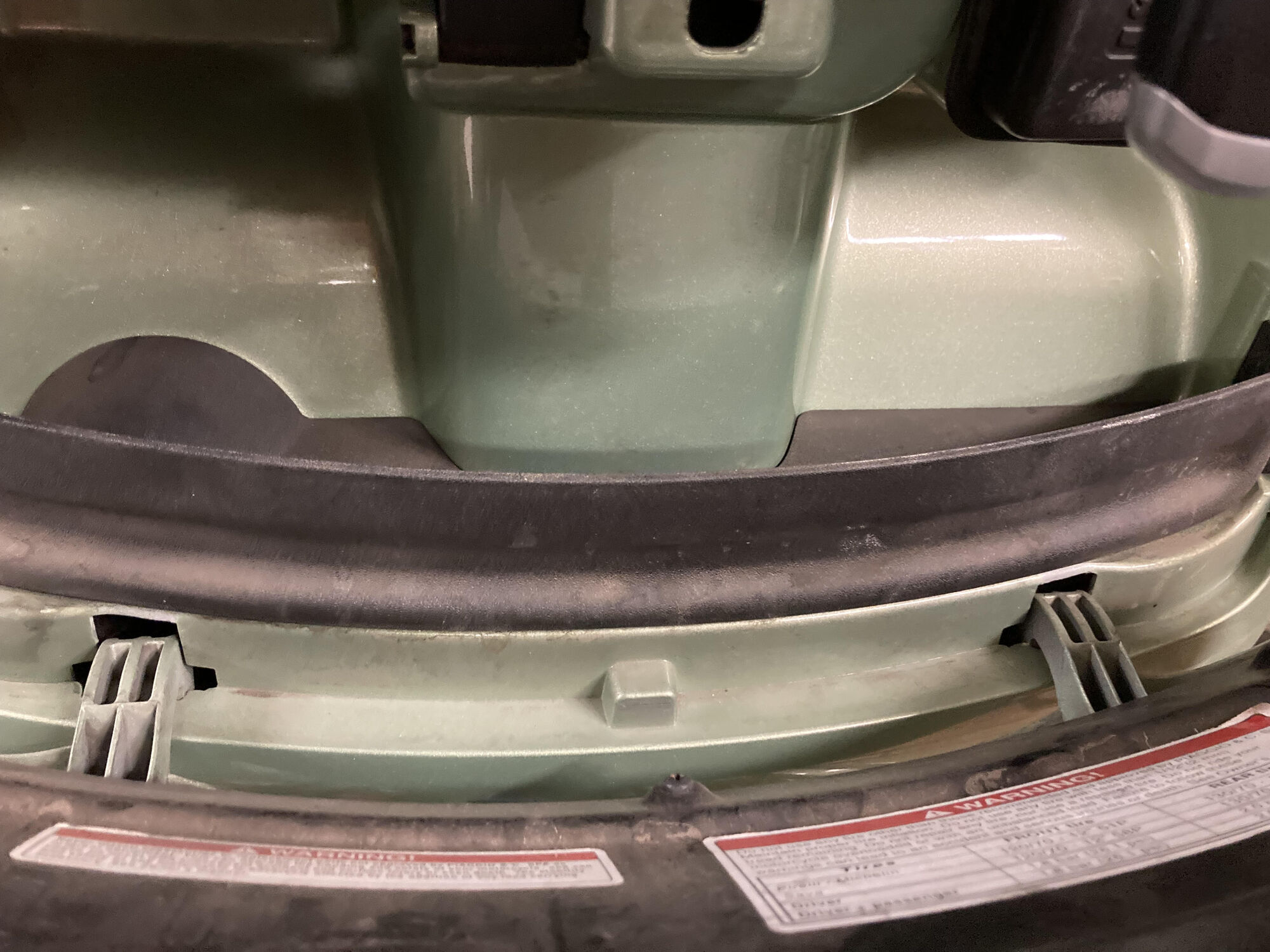 plastic bottom of glove box