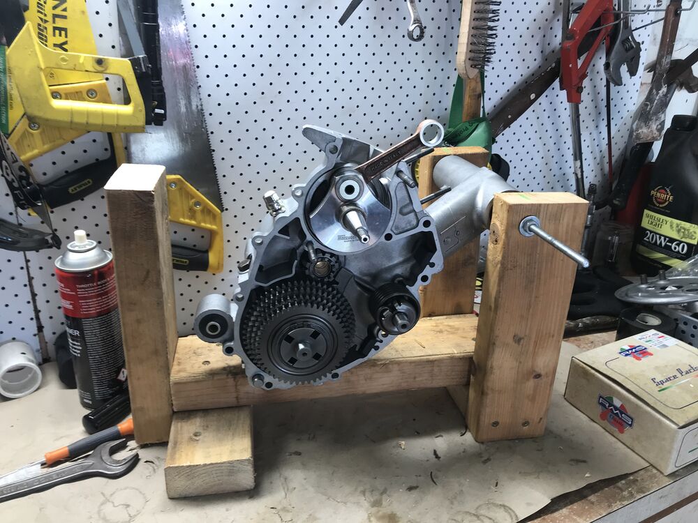 I fashioned up a wooden engine stand. Am nearly ready to close the cases.