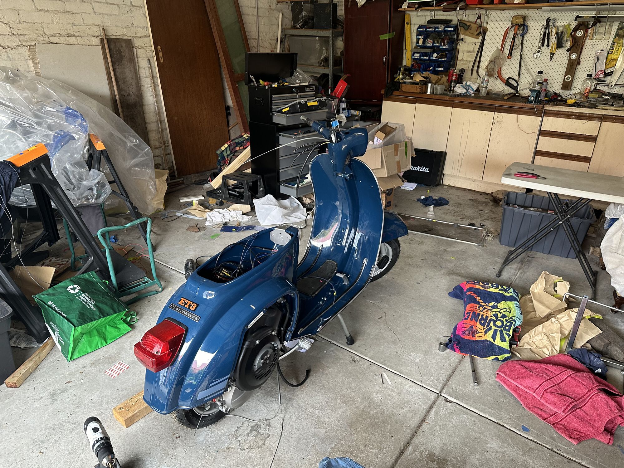 On its wheels again.