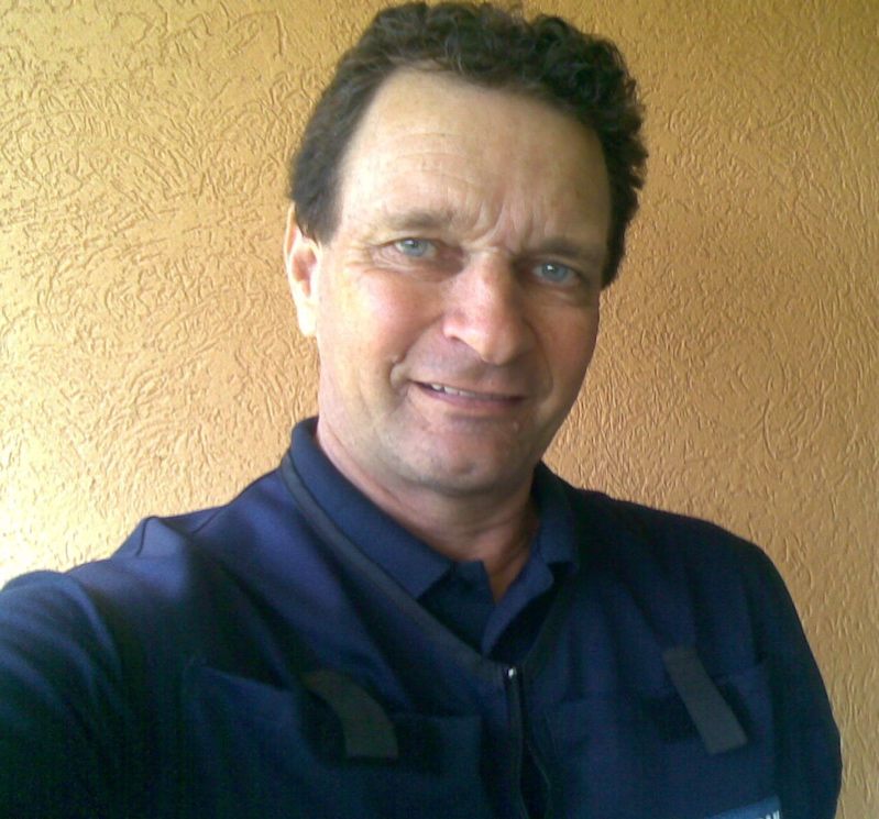 Ray wearing Cool Vest over dark blue shirt