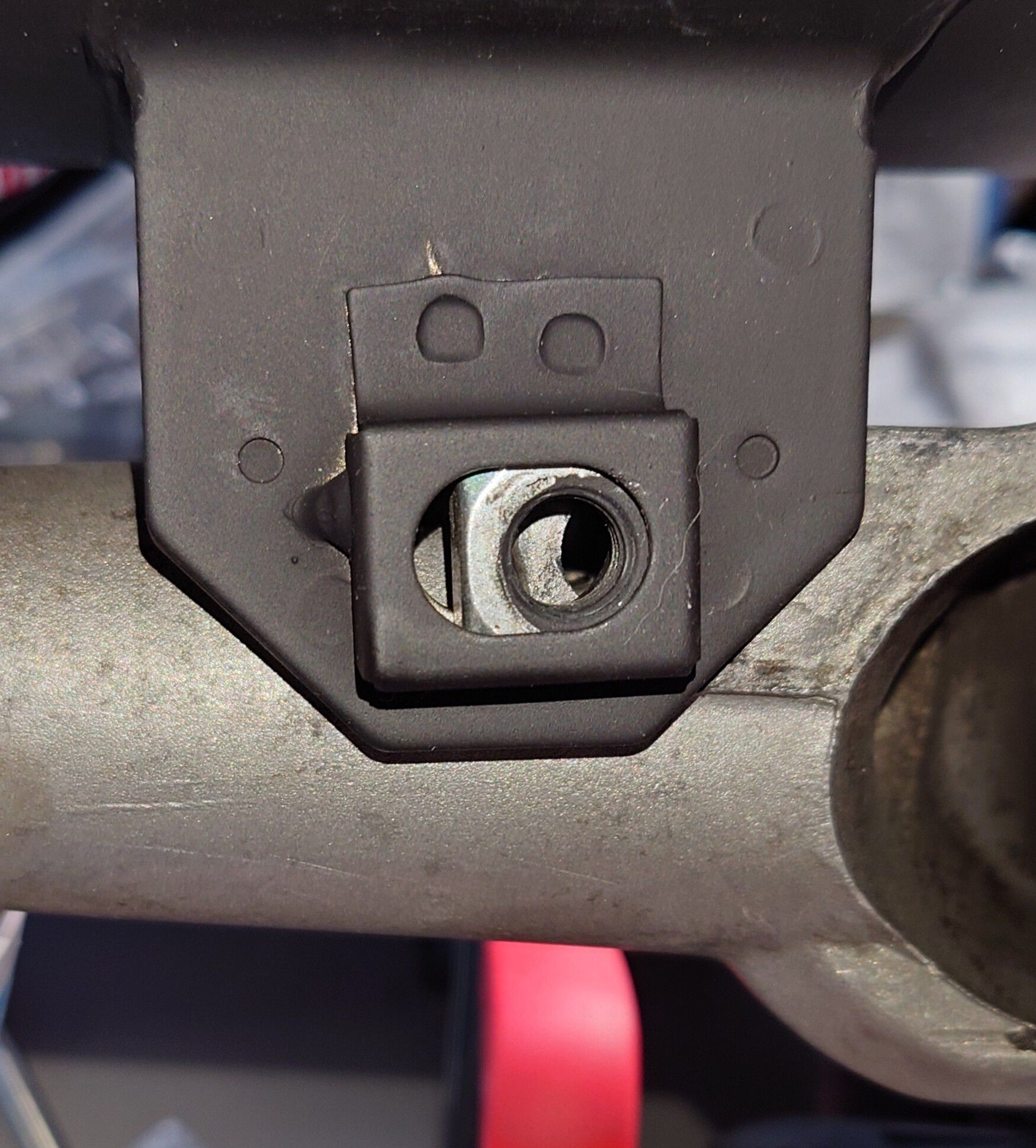 And how far off it's from the bracket bolt hole. 
Ok, this can be worked around maybe, by bending the exhaust can bend.
But, in this scenario, the can is not parallel with the swingarm. Not sure it should be in the first place. 🤔