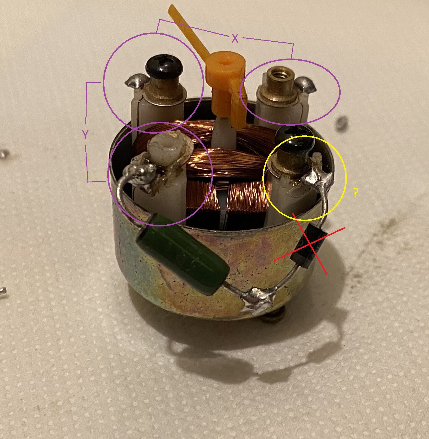 I see 3 posts with copper wire, in purple. One, presumed + post, looks like it has 2 wires, which is correct if that is + indeed. Other 2 posts only show 1 wire each. So that forms coils X & Y. What about 4th post (diode currently soldered to it)?