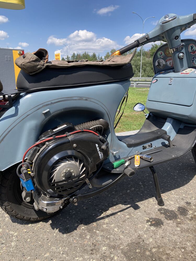 All was ok and Vespa flies easily on 90 km/h but after 85 km of route past it suddenly stalls. Thought about seize but temperature was not higher than 145ºC(293ºF). 
Check fuel - ok. 
I tried to kick it and starts from first kick. Ride another 4 km and it