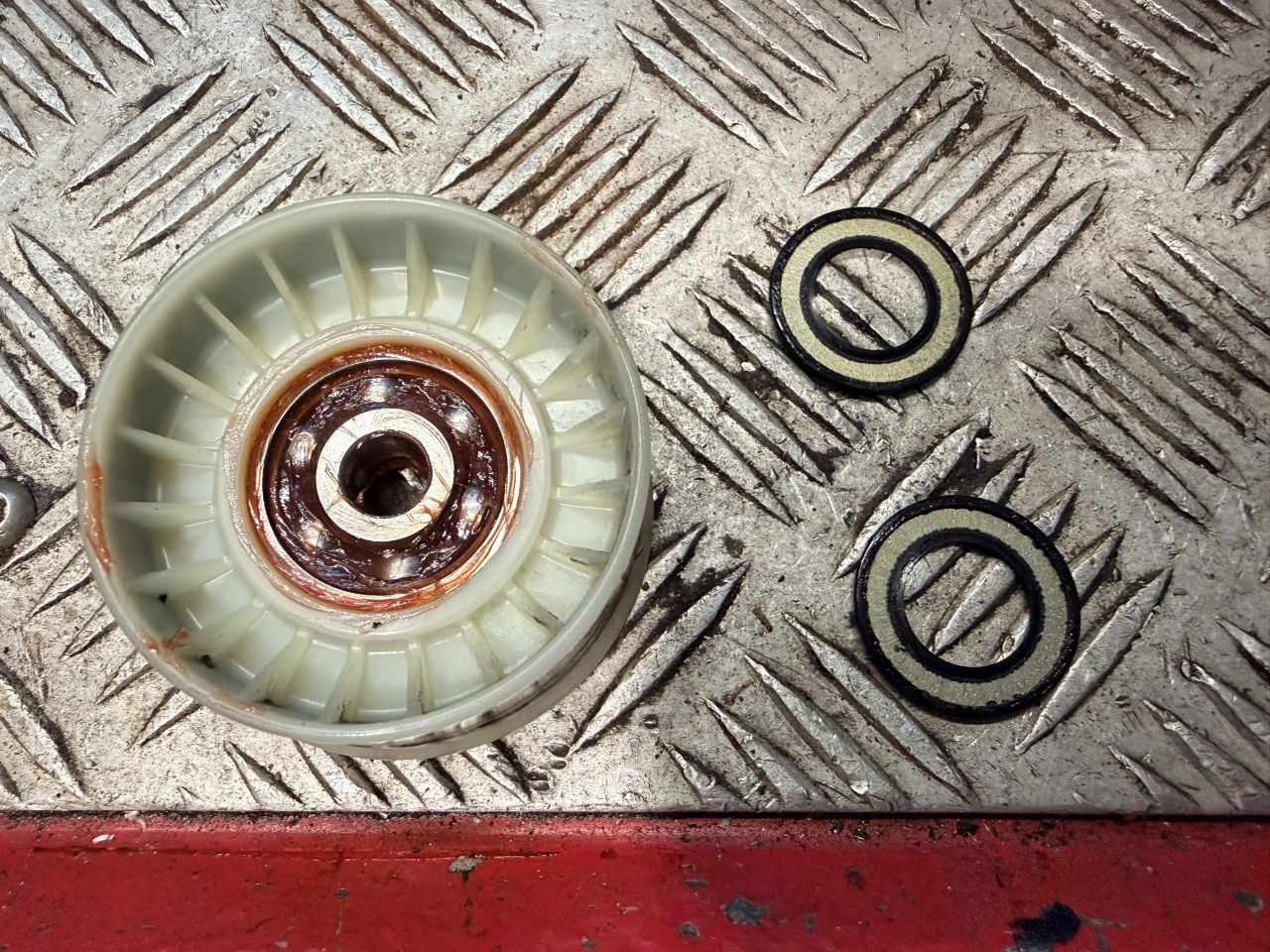 Idler pulley regrease