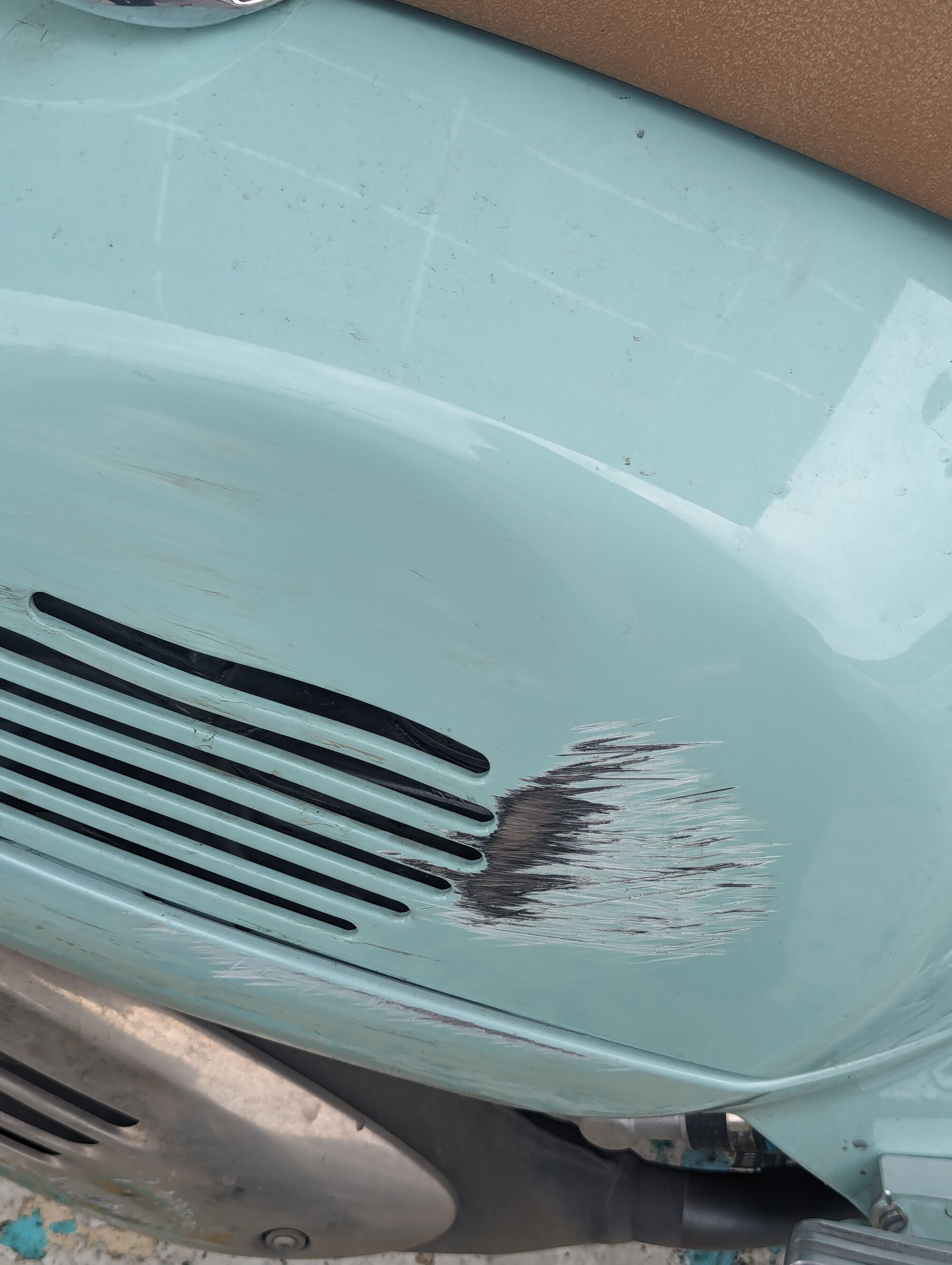 Fender over gas tank.