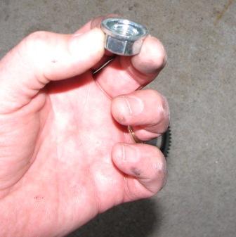 It has an integral spring washer.