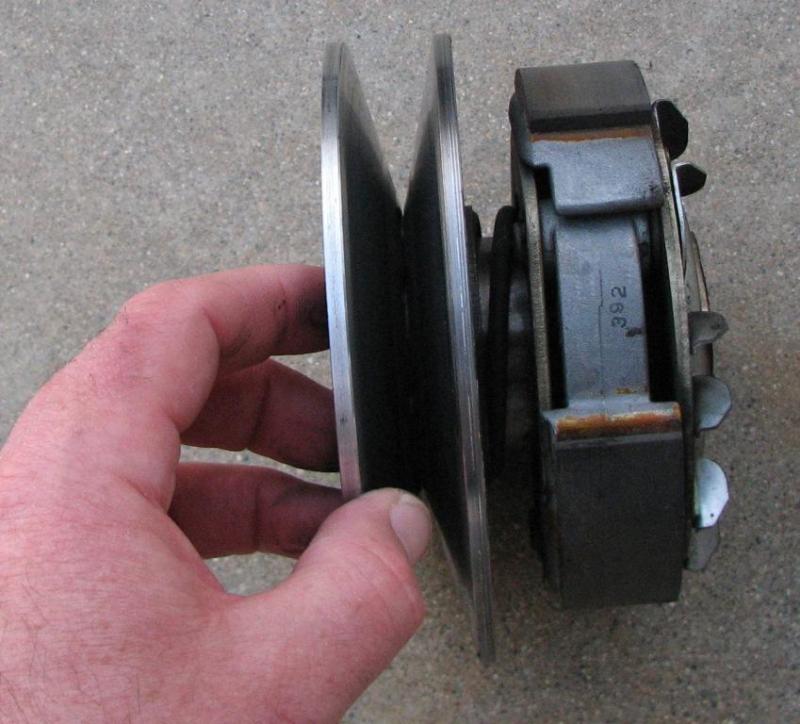 Note the spring between the clutch and the outer driven half pulley.