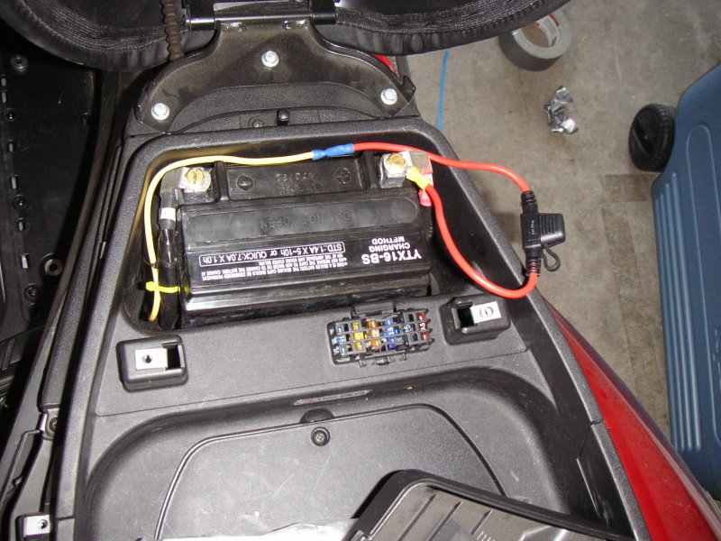 14g wire attached to a inline 20A blade fuse and straight to the battery.