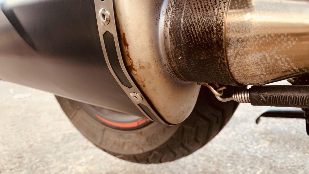 Noticed a leak within 3 days of installation. You can see the residue from the exhaust around the front of the van near the medal band that appears to have hex. What shall I do?