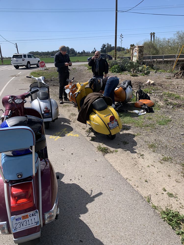 Roadside cable repair. At least 4 random people stopped to offer tools and help. Good folks in SLO.